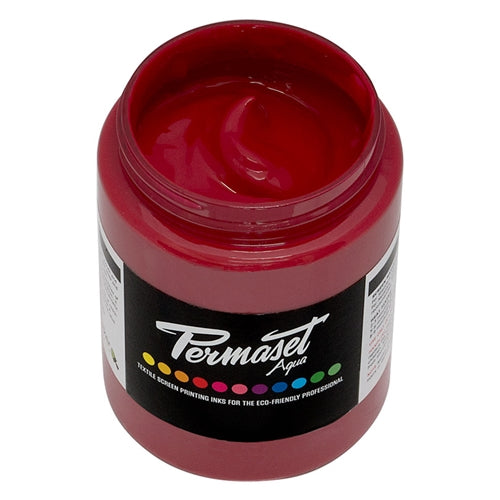 Permaset Aqua Standard Ink in Mid Red, a vibrant water-based textile ink, shown in a close-up image highlighting its smooth consistency.